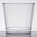 A Fineline clear plastic tumbler on a white surface.