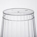 A close up of a clear Fineline hard plastic crystal tumbler.