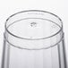 A close up of a Fineline clear hard plastic crystal tumbler.