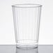 A clear Fineline plastic tumbler on a white surface.
