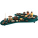 A Tablecraft hunter green and white speckled two tiered platter with a variety of chocolate desserts on it.