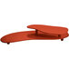 A copper cast aluminum Tablecraft two tiered platter on a red table.