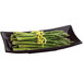 A Tablecraft Midnight Speckle cast aluminum flared rectangular platter with asparagus and lemon slices.