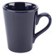 A cobalt blue Venice Victory mug with a handle.