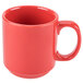 A close-up of a red CAC Venice coffee mug with a handle.
