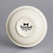 A white Tuxton china soup cup with black text and a bow tie logo.