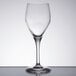 A close-up of a Chef & Sommelier wine glass on a table.
