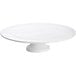 A Tablecraft white cast aluminum cake stand with a white pedestal.