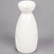 A white porcelain sake bottle with a handle.