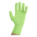 A hand wearing a lime green Victorinox PerformanceFIT level cut resistant glove.
