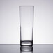 A clear Libbey tall highball glass on a table.