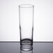 A Libbey tall highball glass on a reflective surface.