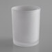 A clear glass Sterno Petite Frost Votive Liquid Candle Holder on a gray surface.