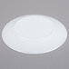 An Arcoroc white glass side plate with a circular rim.