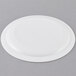 An Arcoroc white glass lunch plate with a narrow rim.