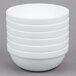 A stack of Arcoroc white stacking bowls.