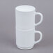 Two white Arcoroc stacking mugs with handles.