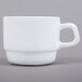 A white Arcoroc cup with a handle.