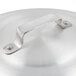 An aluminum lid for a Town Clam Steamer with a metal handle.
