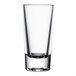 A clear shot glass with a small black rim.