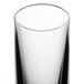 A close up of a clear Thunder Group plastic shooter/dessert glass with a thin rim.