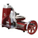 A red and silver Berkel 330M-STD meat slicer.