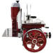 A red and silver Berkel 330M-STD meat slicer.