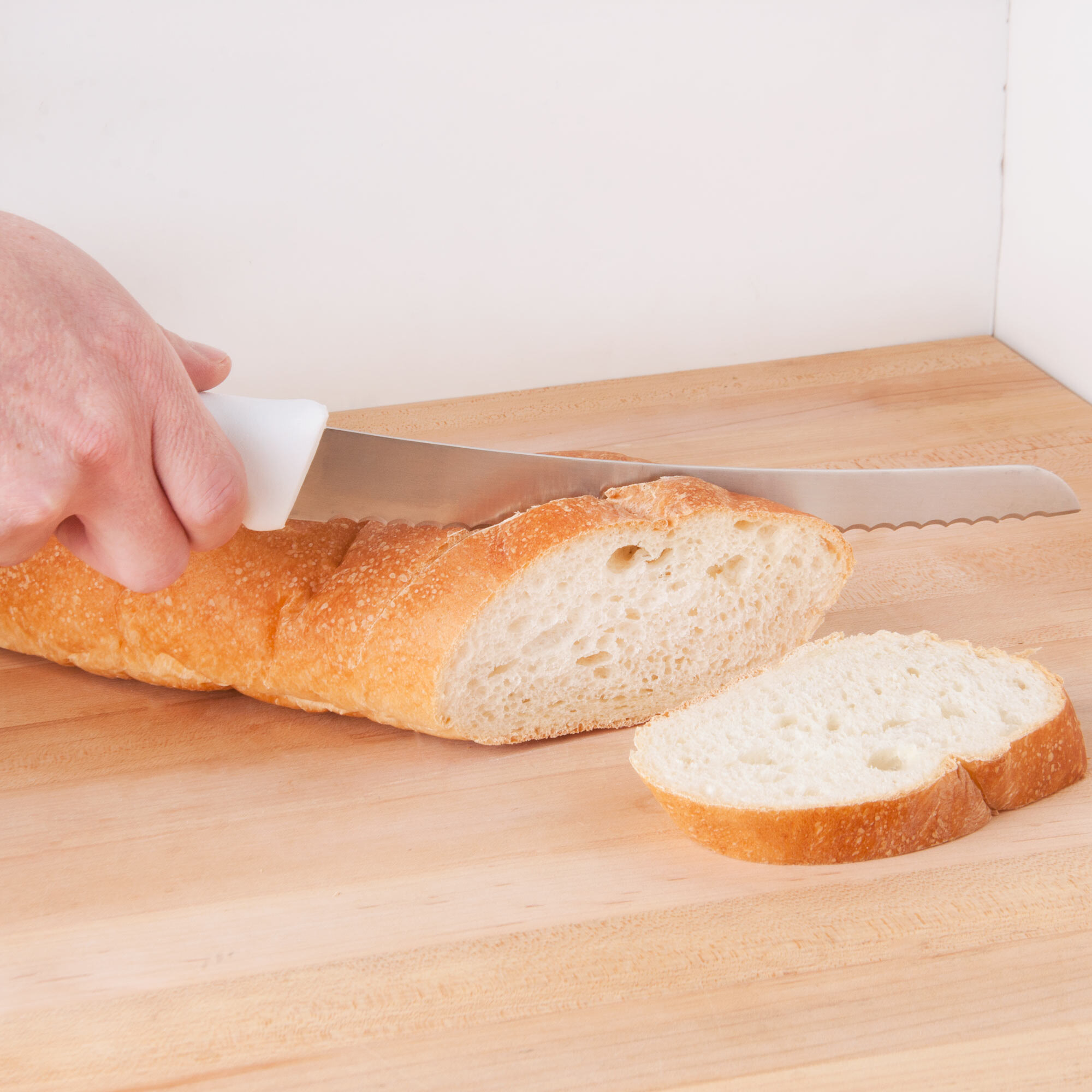 9 1/2" Curved Serrated Bread Knife with White Polypropylene Handle