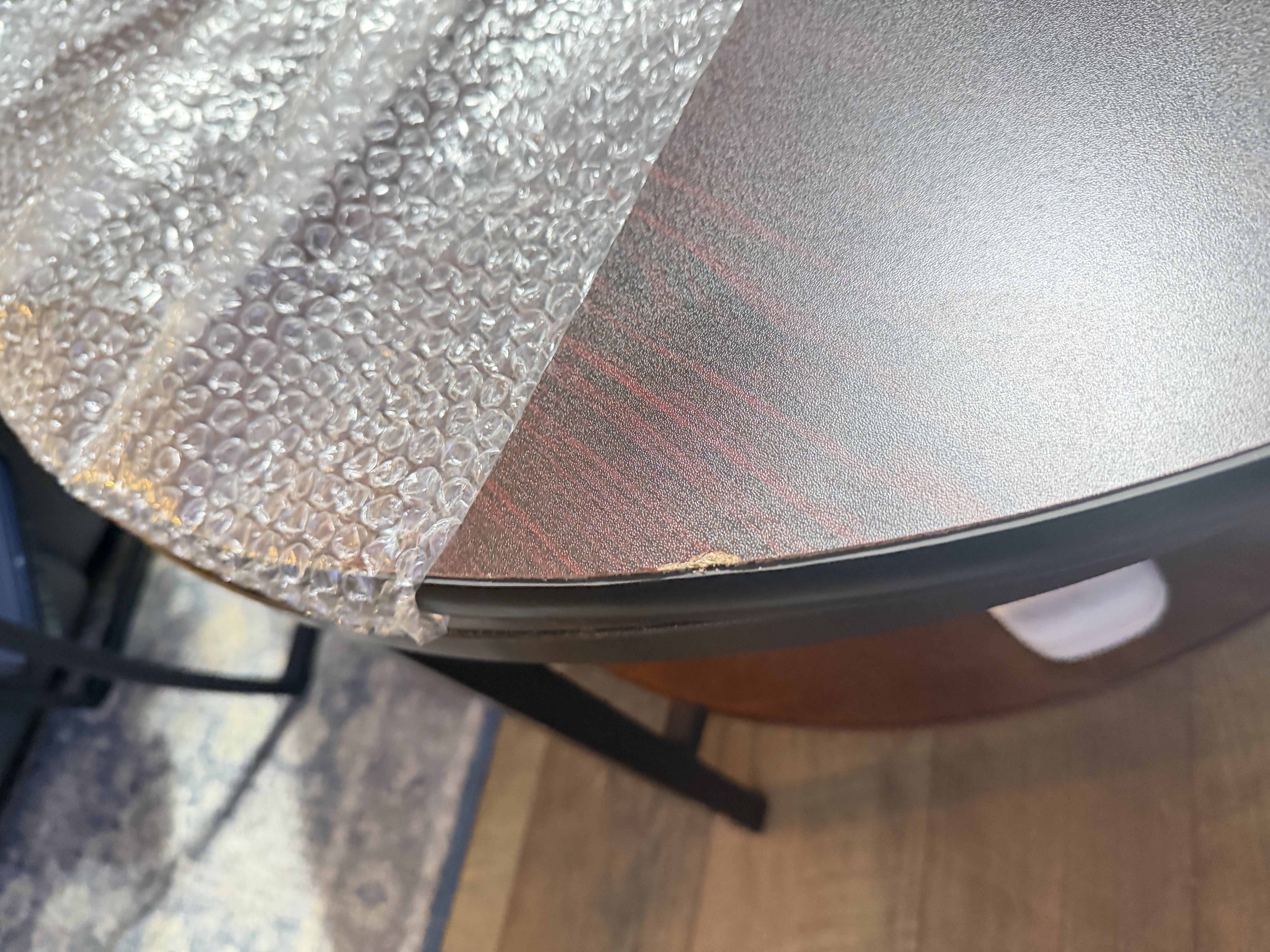 Table rim was damaged in 2 places