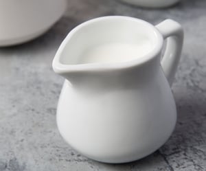 Acopa 3.5 oz. Bright White Porcelain Creamer - 12/Pack