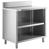 Regency 24" x 36" 16 Gauge Type 304 Stainless Steel Enclosed Base Open Front Table with Adjustable Midshelf and 6" Backsplash