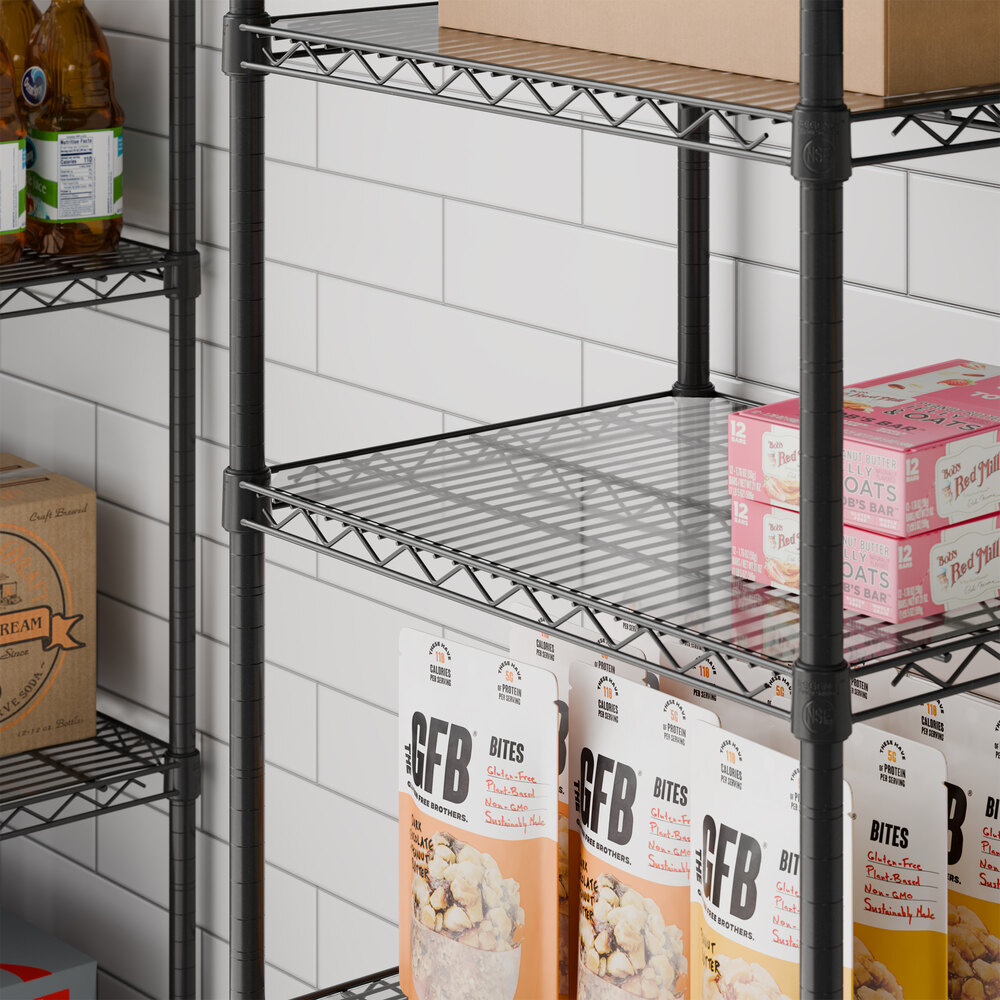 A clear plastic shelf liner placed on a wire shelving unit in a pantry setting.