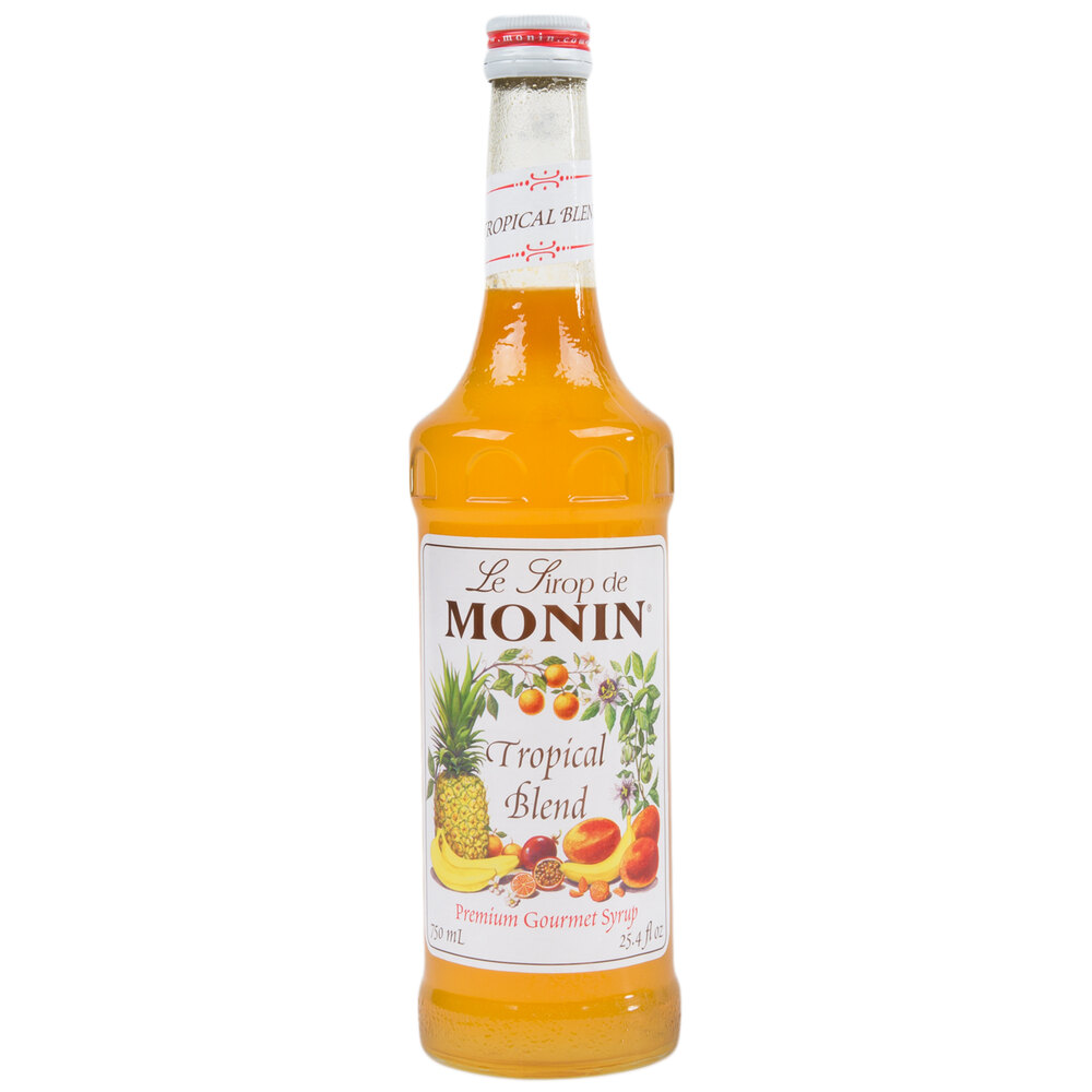 Monin 750 mL Premium Tropical Blend Flavoring / Fruit Syrup