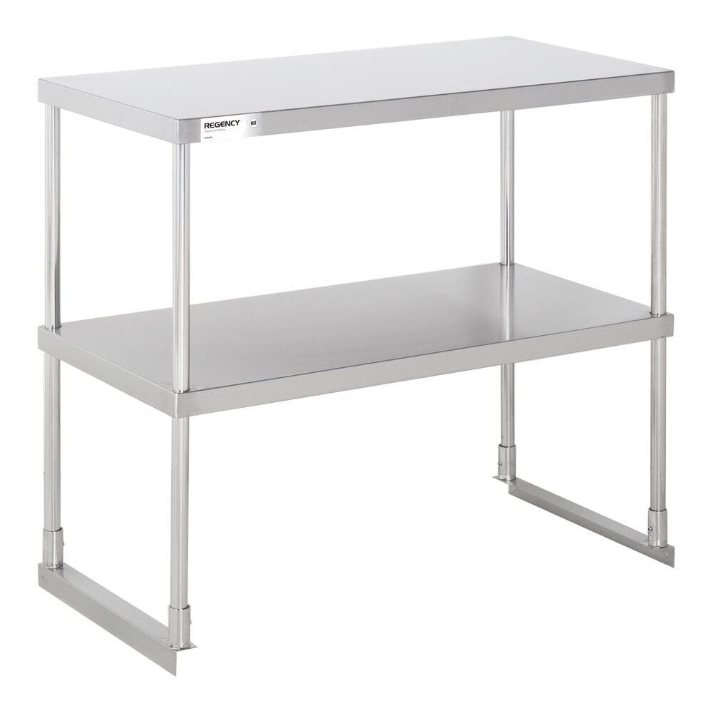 A metal double-deck shelf unit with two flat surfaces and four vertical supports.