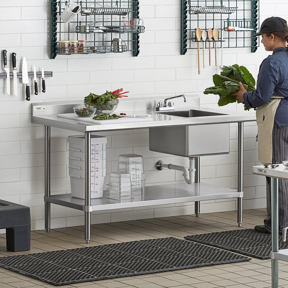 A stainless steel work table with a right-side sink and faucet, featuring an undershelf for storage.