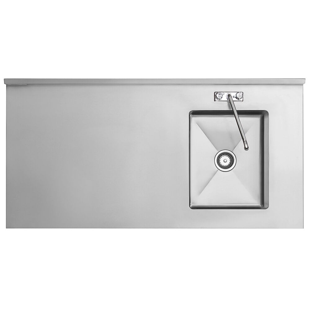 A stainless steel work table with an integrated sink and faucet on the right side.