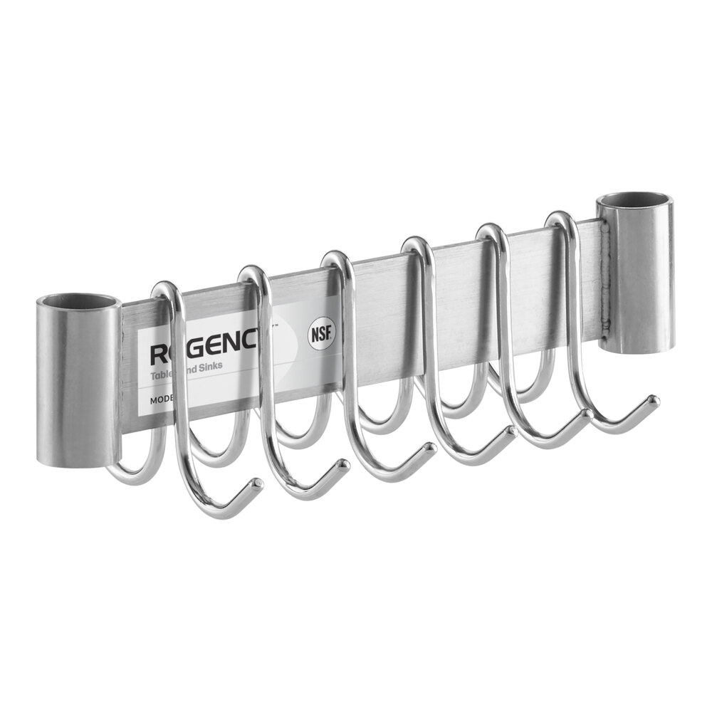 A stainless steel wall-mounted rack with six double prong hooks and cylindrical holders on each end.