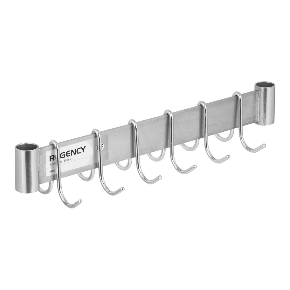 A metal rack with six double prong hooks attached to a horizontal bar, designed for mounting.
