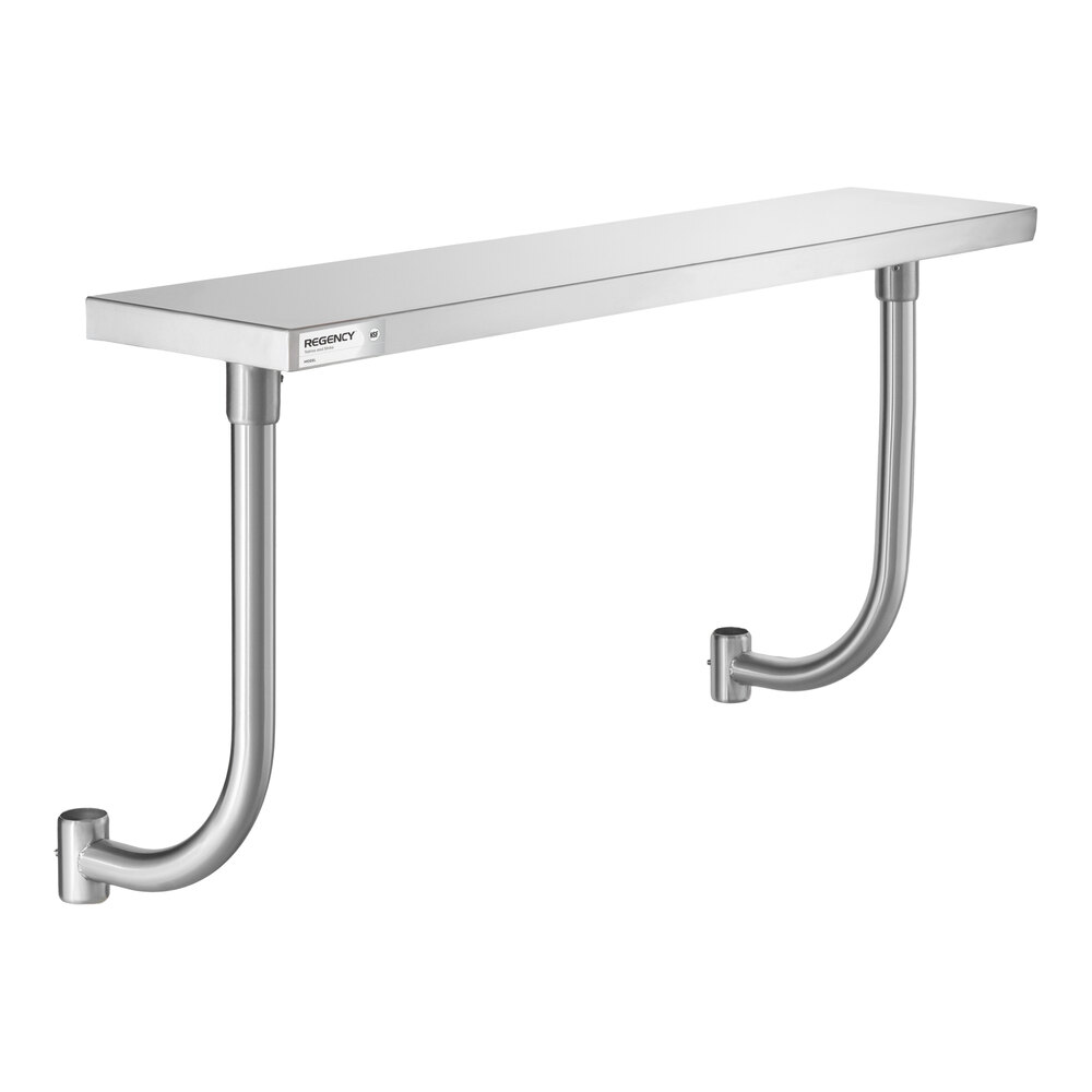 A metal wall-mounted shelf with two curved support brackets.