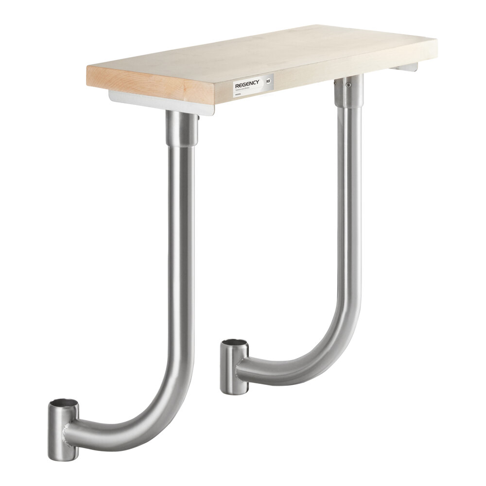 A rectangular wooden board mounted on two curved metal supports.