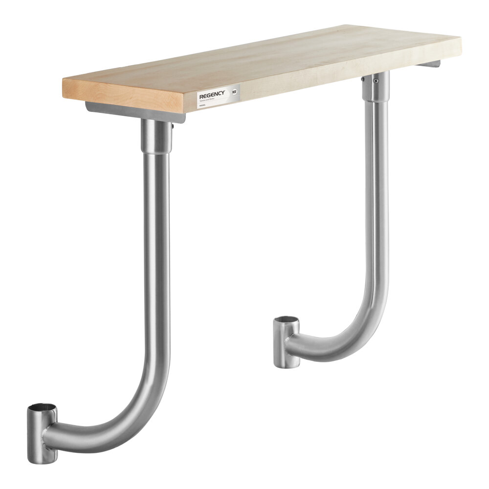 A rectangular wooden board mounted on two curved metal supports.