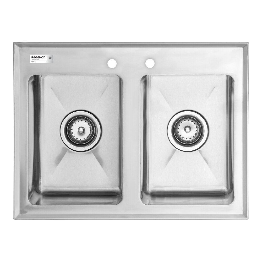 A stainless steel double-basin sink with two drain openings and two faucet holes on the back edge.