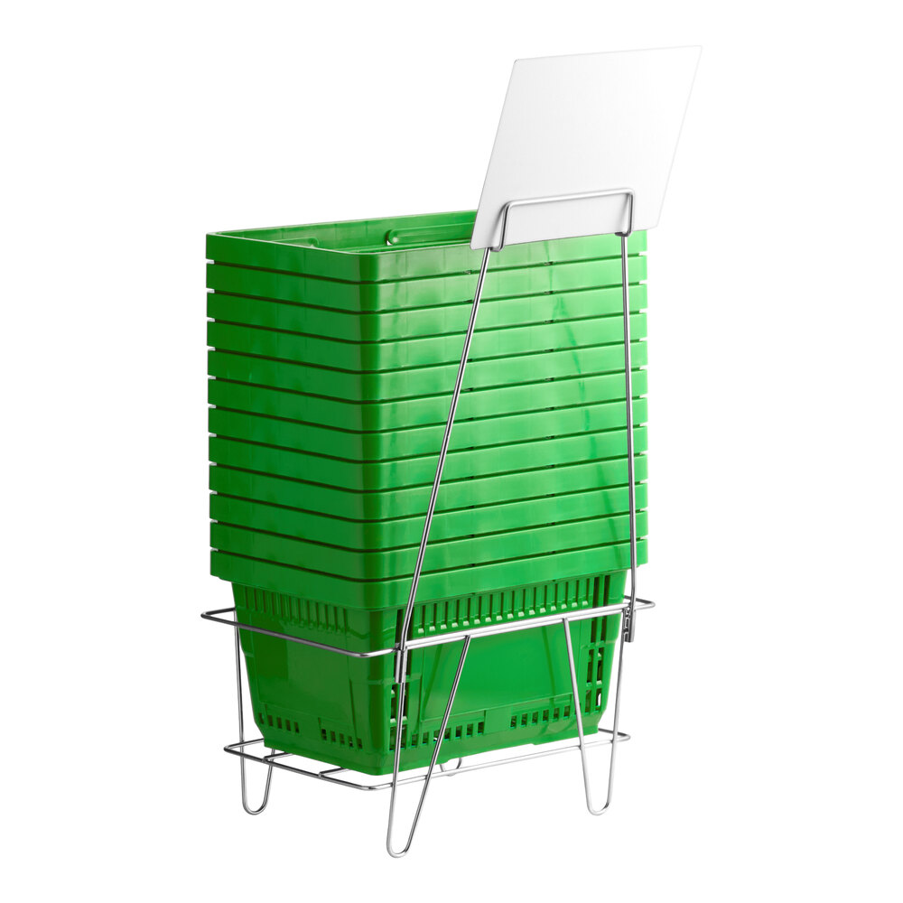 A set of green plastic grocery market shopping baskets stacked on a metal stand with an attached sign holder.