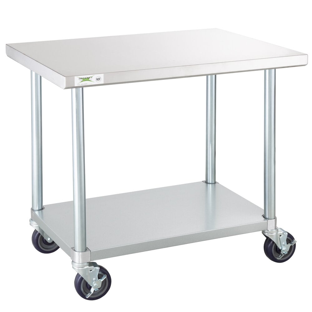Regency 24 inch x 36 inch 18-Gauge 304 Stainless Steel Commercial Work Table with Galvanized Legs, Undershelf, and Casters