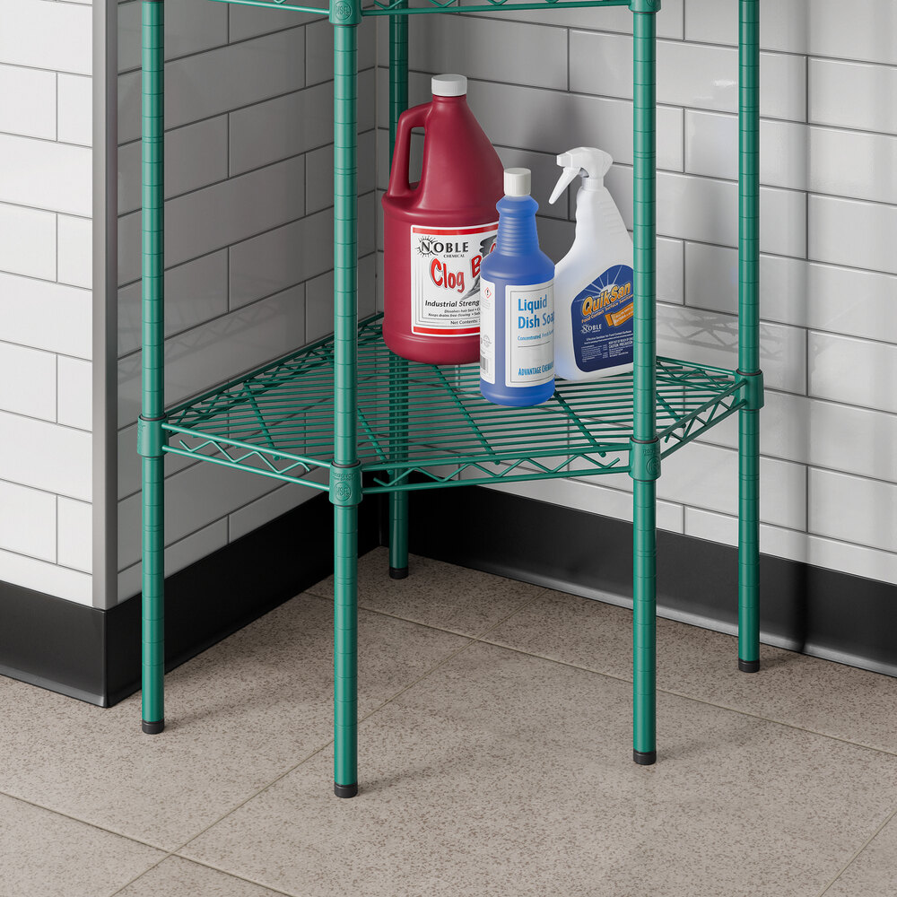 A green epoxy wire pentagon corner shelf used for storage in commercial or residential spaces.