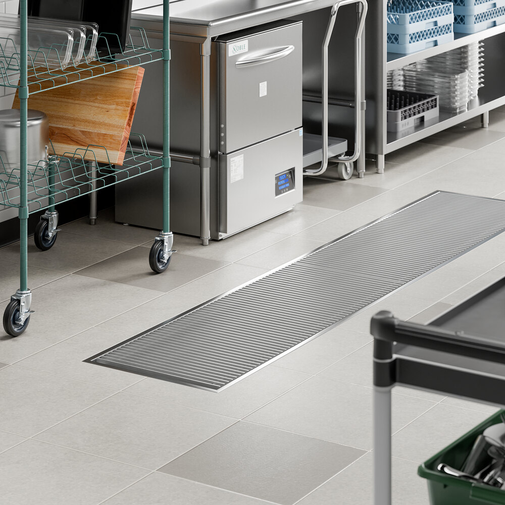 A 24-inch by 108-inch stainless steel floor trough with a grate, designed for commercial kitchen use.