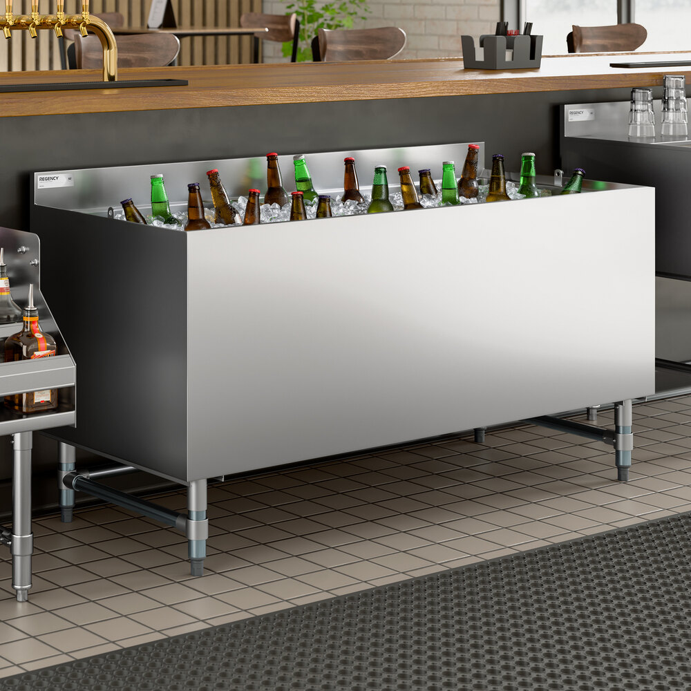 A stainless steel beer box with a backsplash, filled with ice and bottled beverages, designed for bar use.