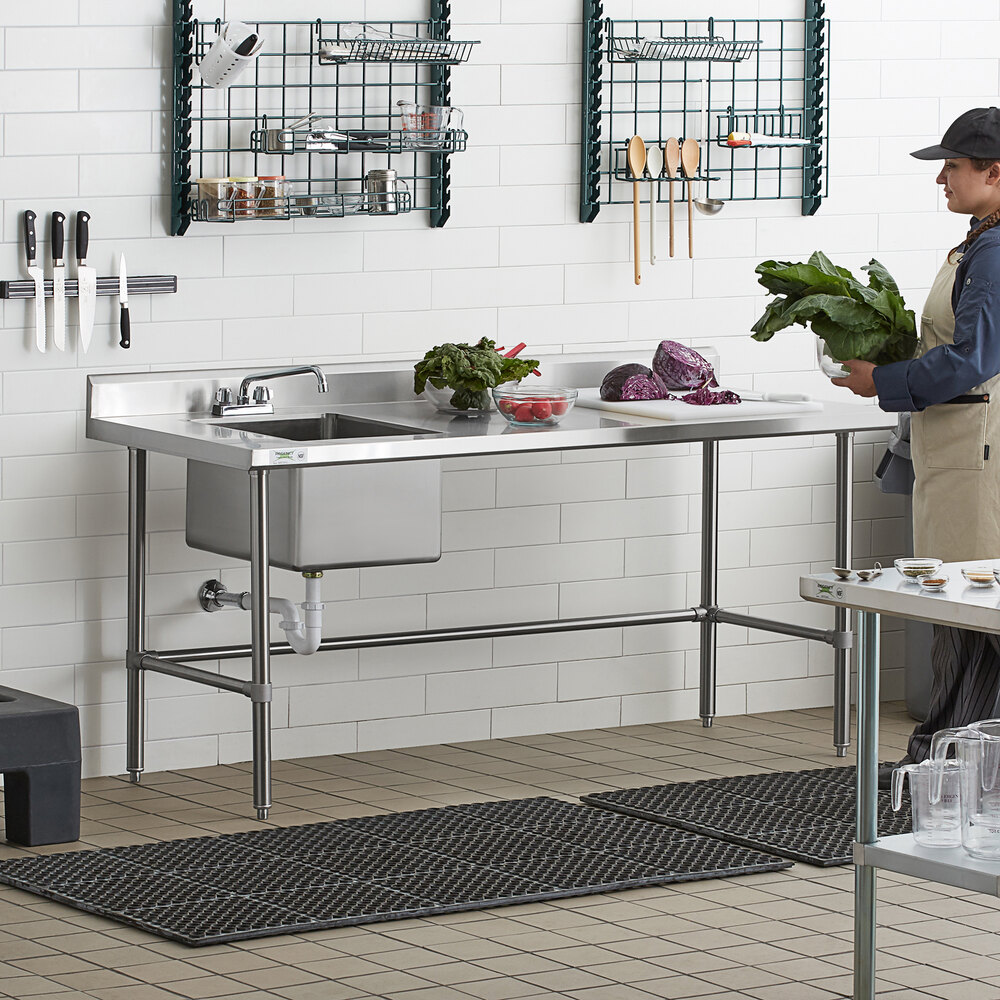 A stainless steel work table with a left-side sink, faucet, and cross bracing.