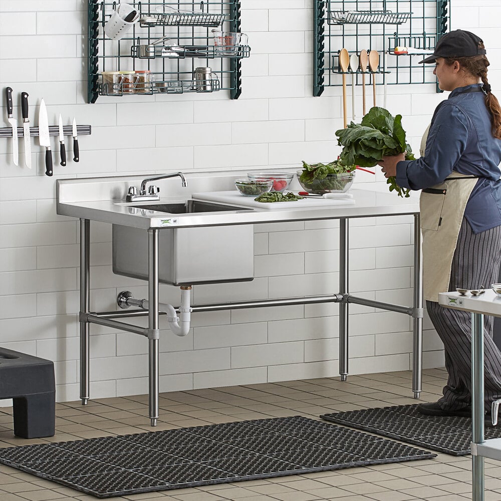 A stainless steel work table with a left-side sink, faucet, and cross bracing.