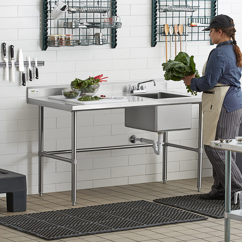 A stainless steel work table with a right-side sink, faucet, and cross bracing.